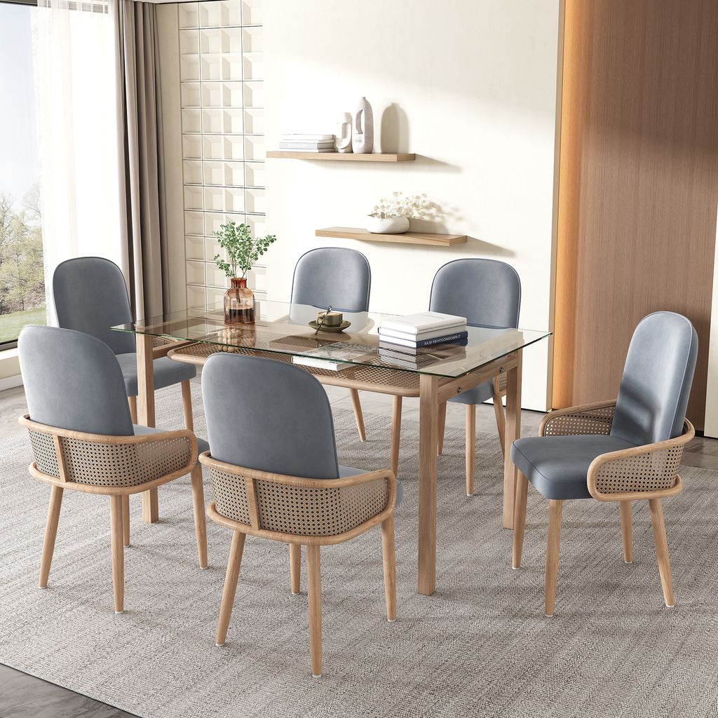 A dining room set with a glass-top table and six chairs.