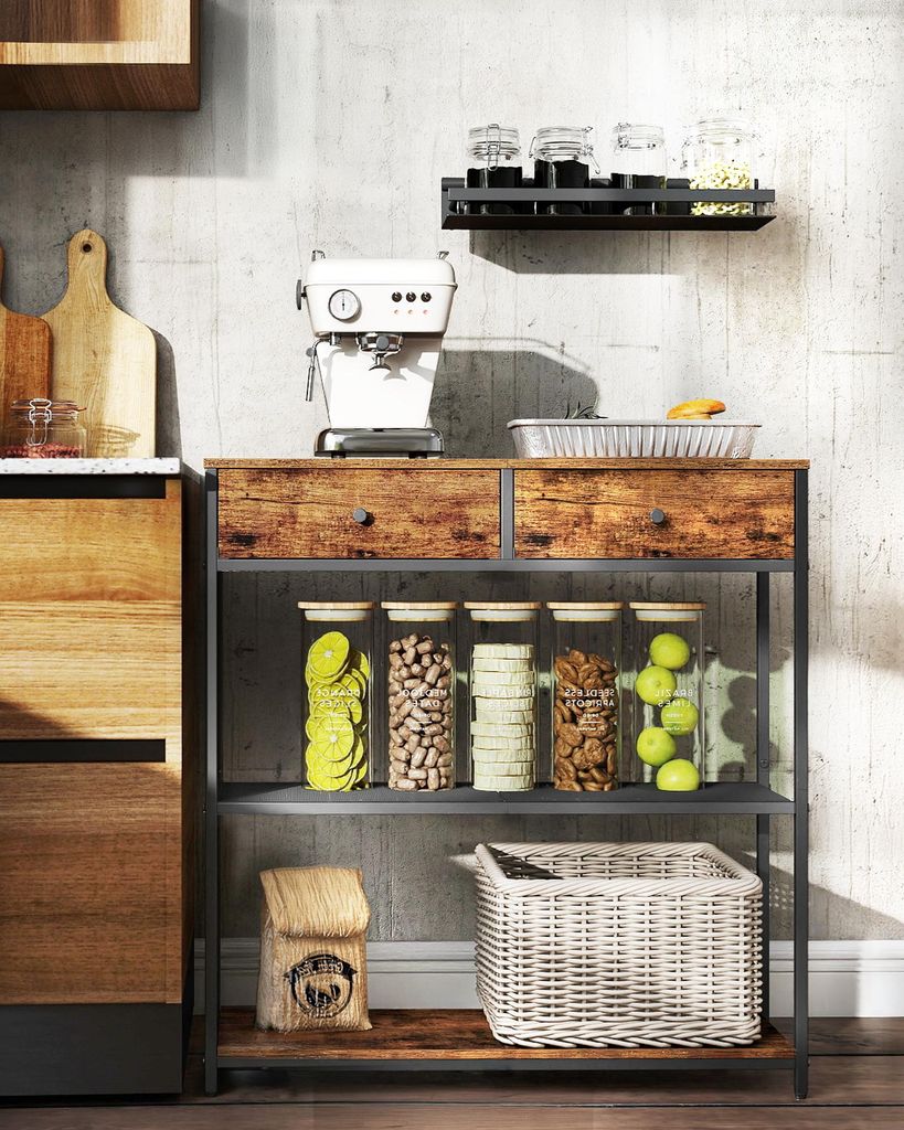 A kitchen counter with various kitchen items including an espresso machine, jars of food, a basket, and a wooden cabinet.