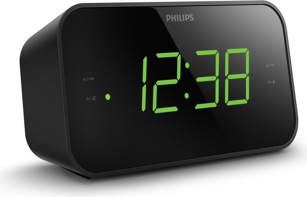 A black Philips alarm clock with a green digital display showing the time.