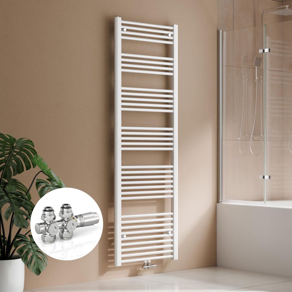 A white towel radiator is shown mounted on a light brown wall next to a bathtub with a glass shower screen. A potted plant is visible in the foreground.