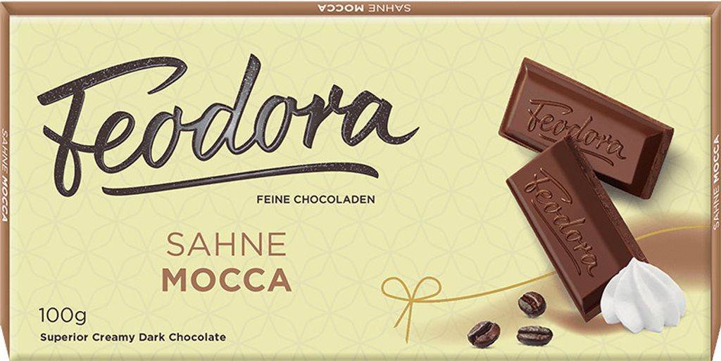A chocolate bar package with two pieces of chocolate and coffee beans.