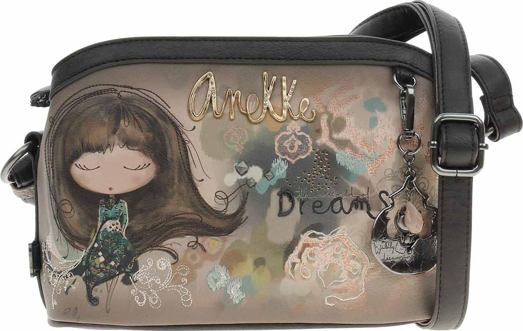 A close-up studio shot of a crossbody bag with a detailed illustration.