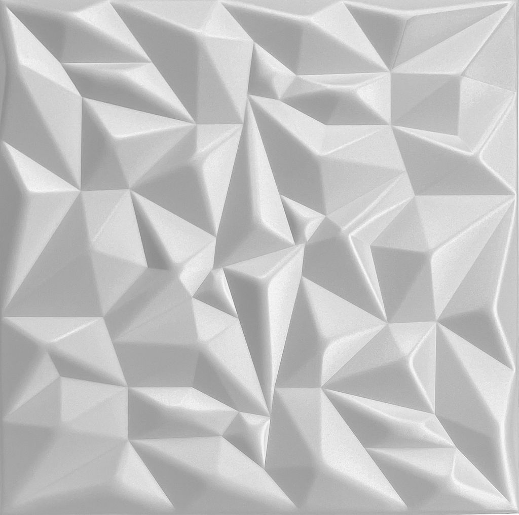 A white, textured wall panel with a geometric, faceted design.
