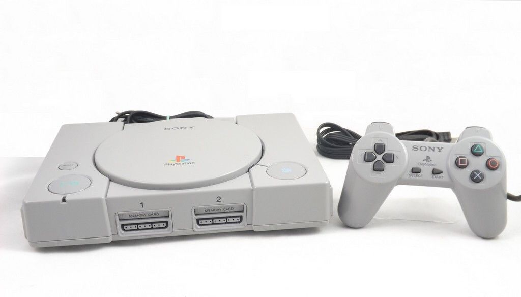 A Sony PlayStation 1 console and controller are displayed on a white background.