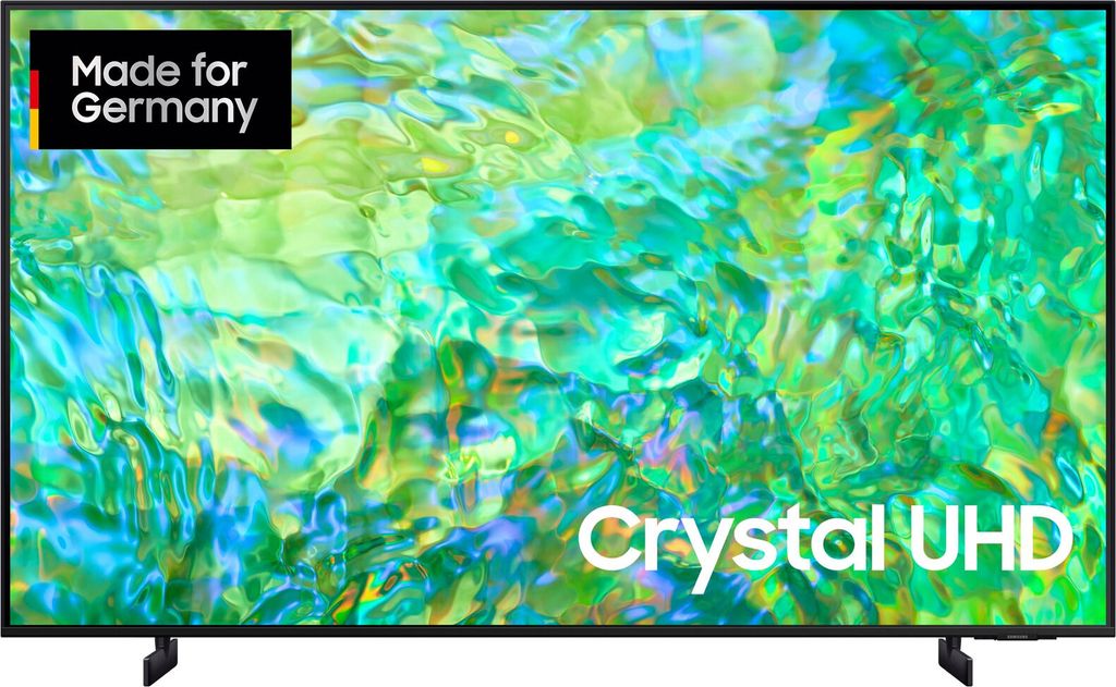 A Samsung Crystal UHD TV displaying a colorful abstract image, with a "Made for Germany" badge in the top left corner.