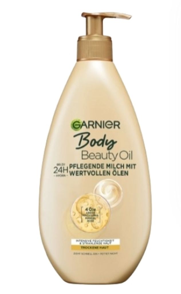 A bottle of Garnier Body Beauty Oil lotion with a pump dispenser, shown against a white background.