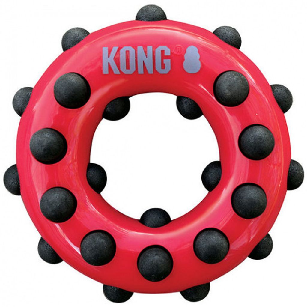 A red circular dog toy with black dots is shown against a white background.