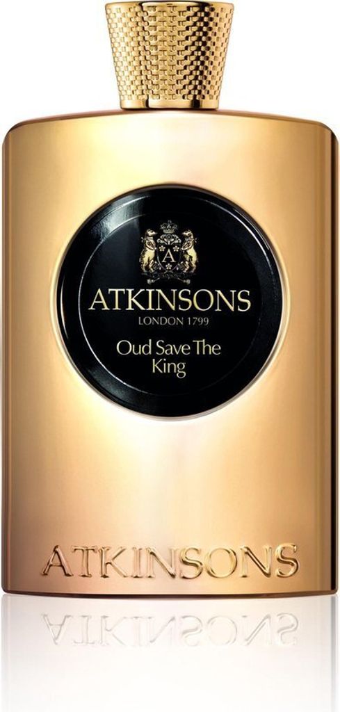 A studio shot of a gold perfume bottle with a black label.