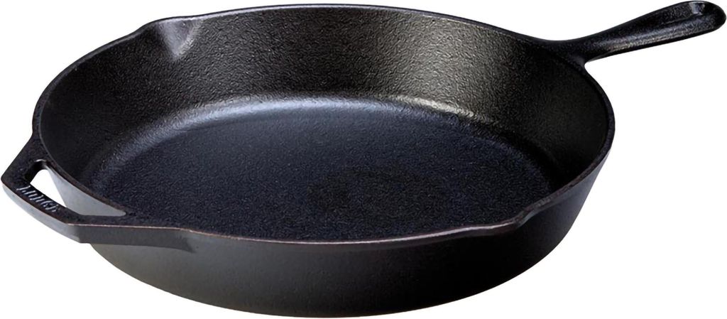 A black cast iron skillet is shown from a slightly elevated side angle against a white background.