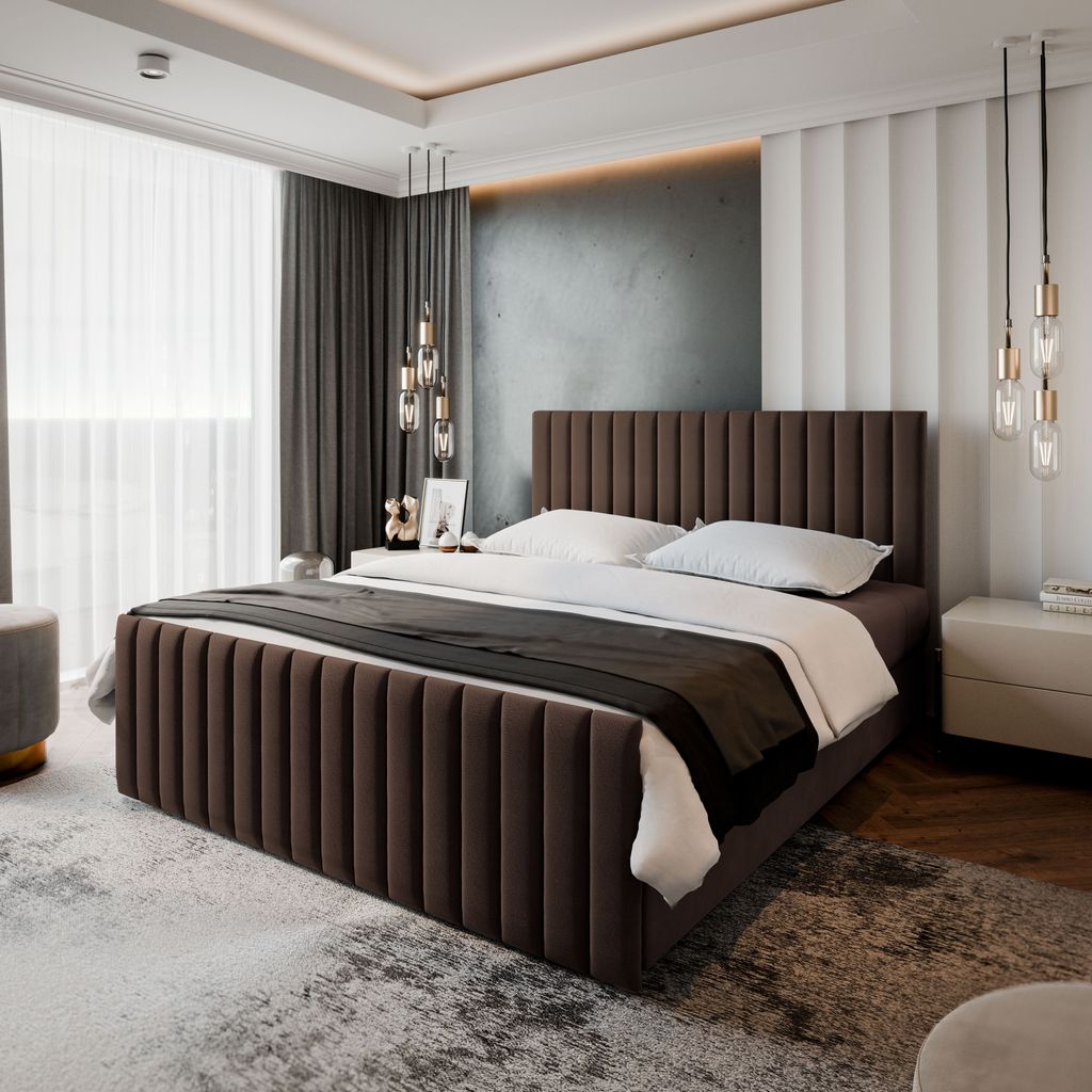 A bedroom with a bed, nightstand, and curtains.