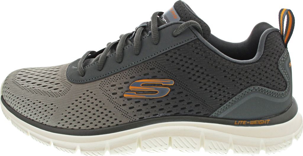 Side view of a single gray athletic shoe.