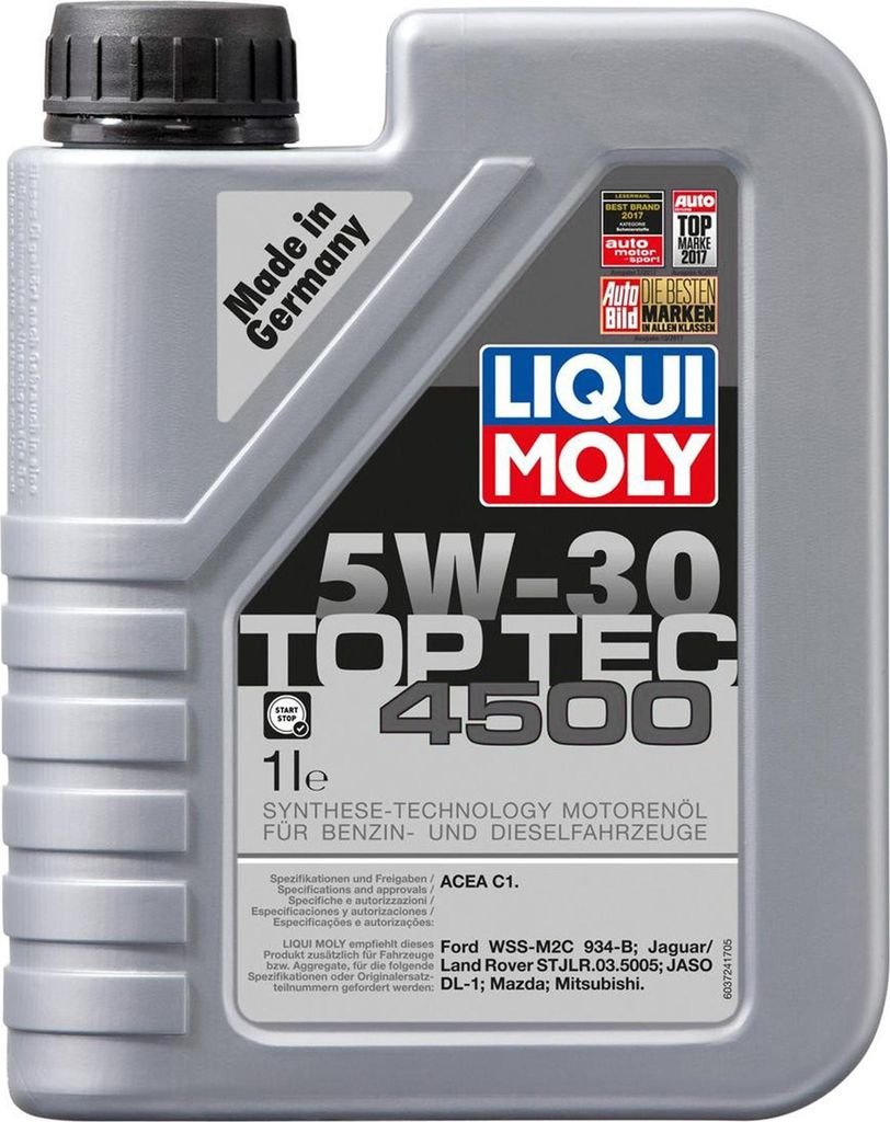 A close-up of a bottle of Liqui Moly engine oil.