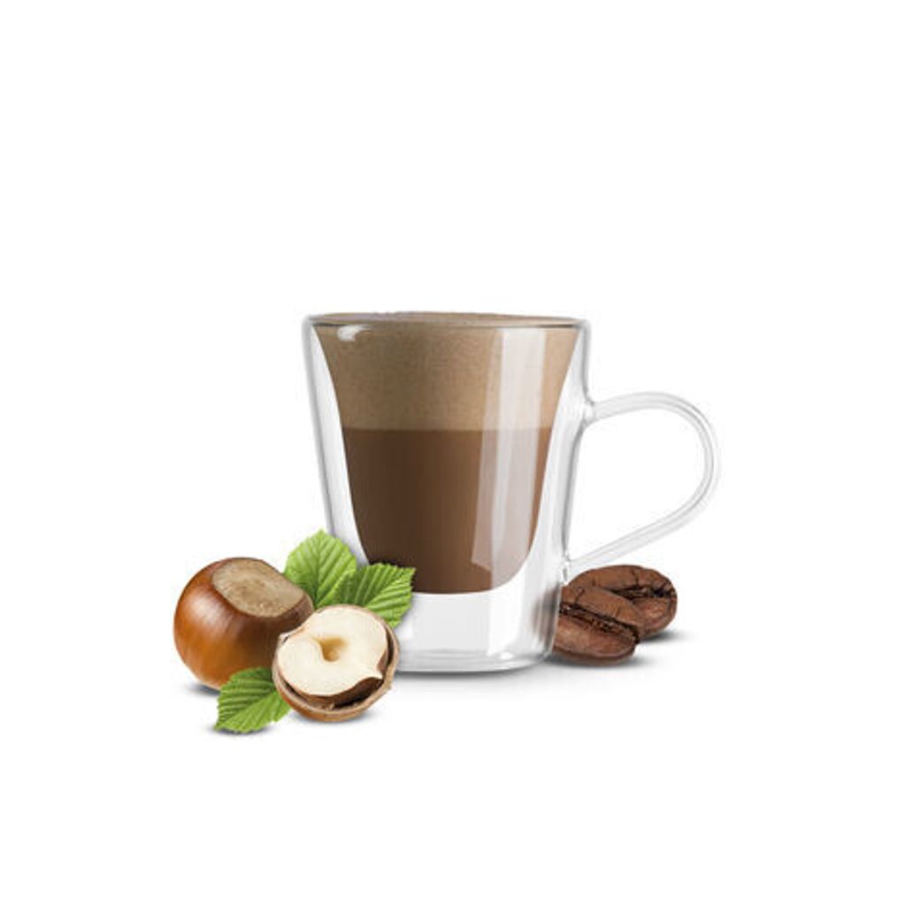 A cup of coffee with hazelnuts and coffee beans.