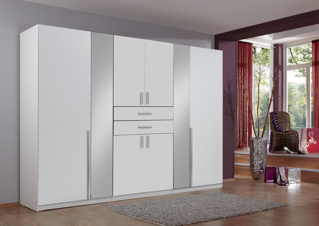 Kleiderschrank "Vanea" in WEISS mit 8 Türen und 4 Einlegeböden. Abmessungen (BxHxT) 270x210x58 cm