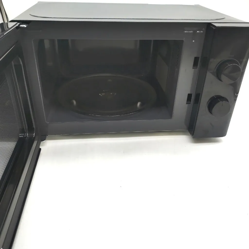 Petit micro-ondes 20L Candy CMW20SMB idéal pour réchauffer et cuisiner - 10