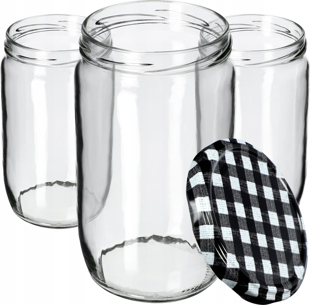 Three clear glass jars with a black and white checkered lid in front of them.