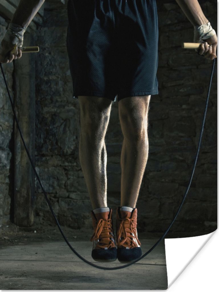 MuchoWow Poster Ein weißer Boxer springt beim Fitness über ein Seil. 120x160 cm - Wandbilder