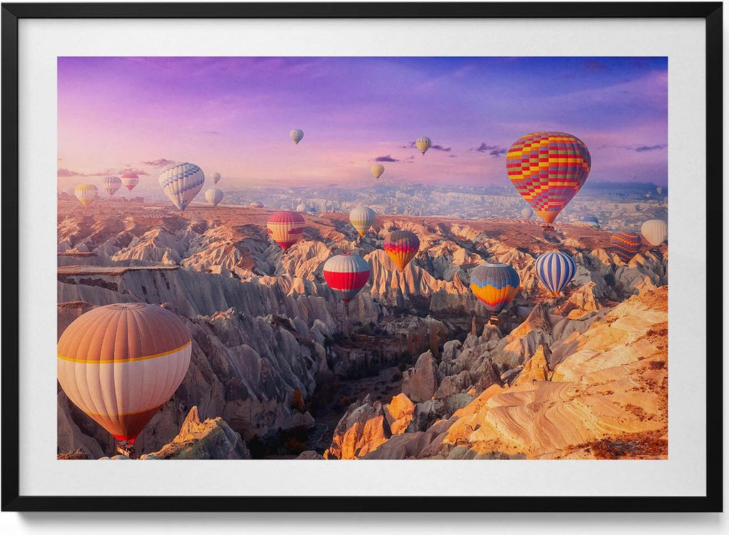 Ballons fliegen über eine Schlucht– Wandbild mit Rahmen – Gerahmtes Bild – Wanddekoration – 100x70 cm – Schwarz Rahmen