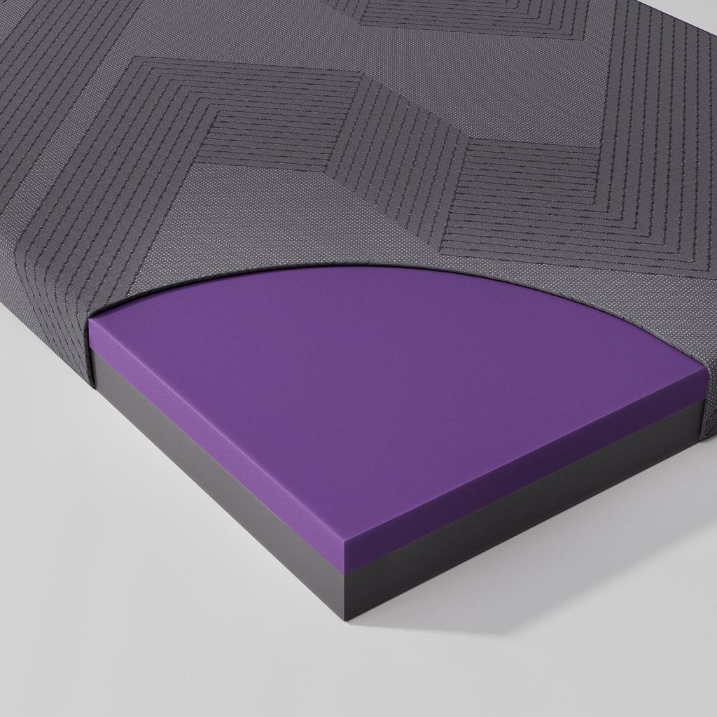 A cutaway view of a mattress showing its layers and texture.