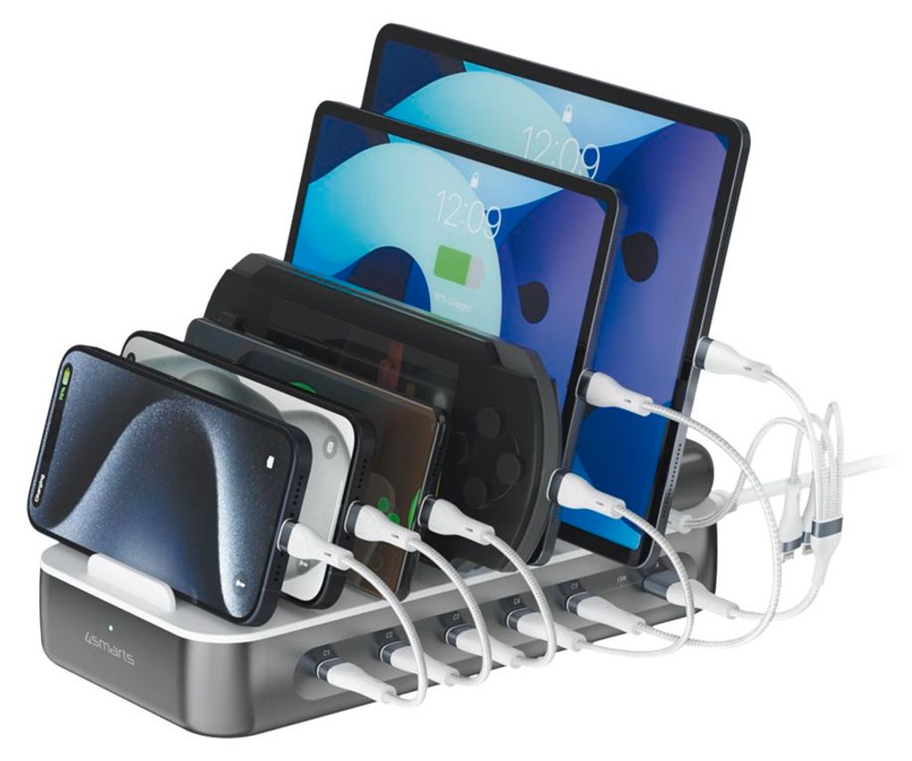 A charging station with multiple devices plugged in.