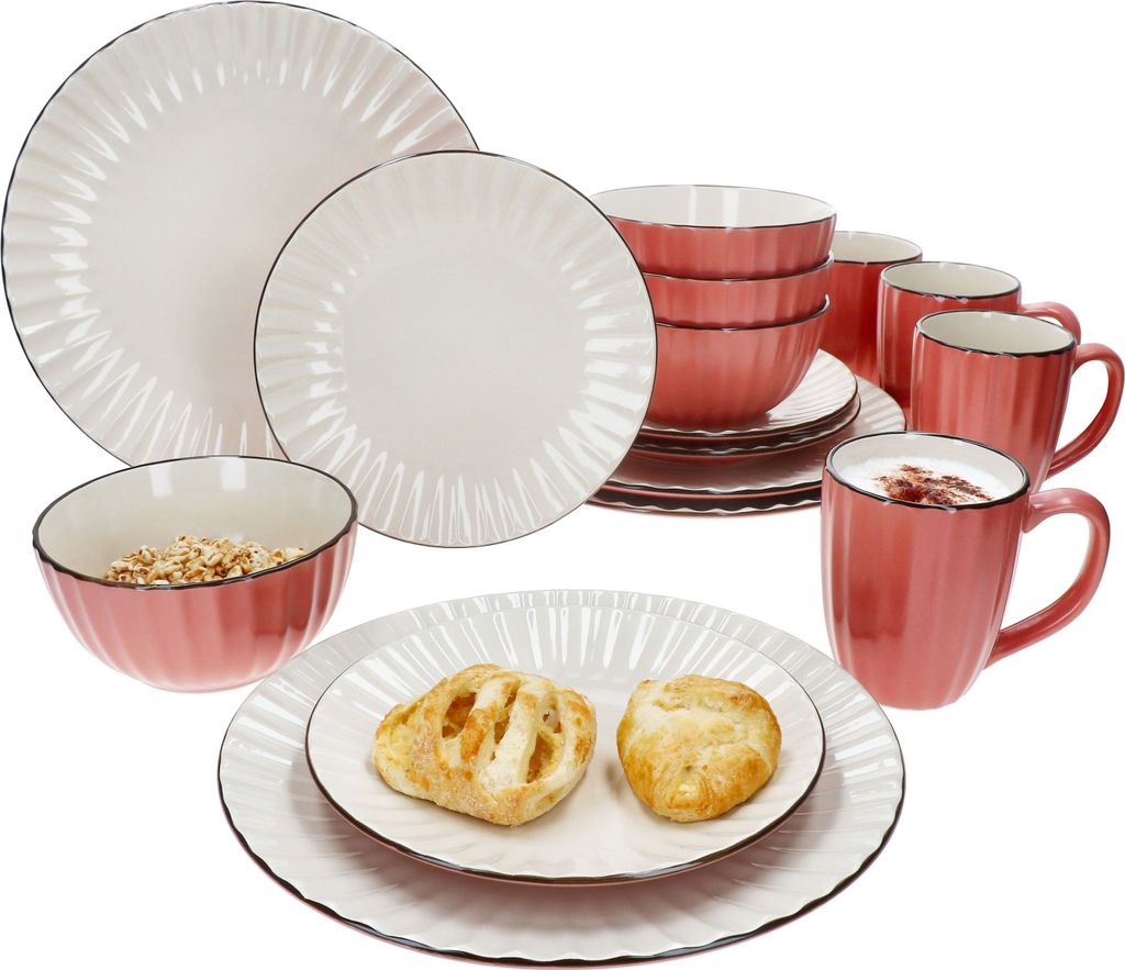 A set of dinnerware, including plates, bowls, and mugs, arranged on a white background.