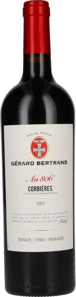 A bottle of red wine against a white background.