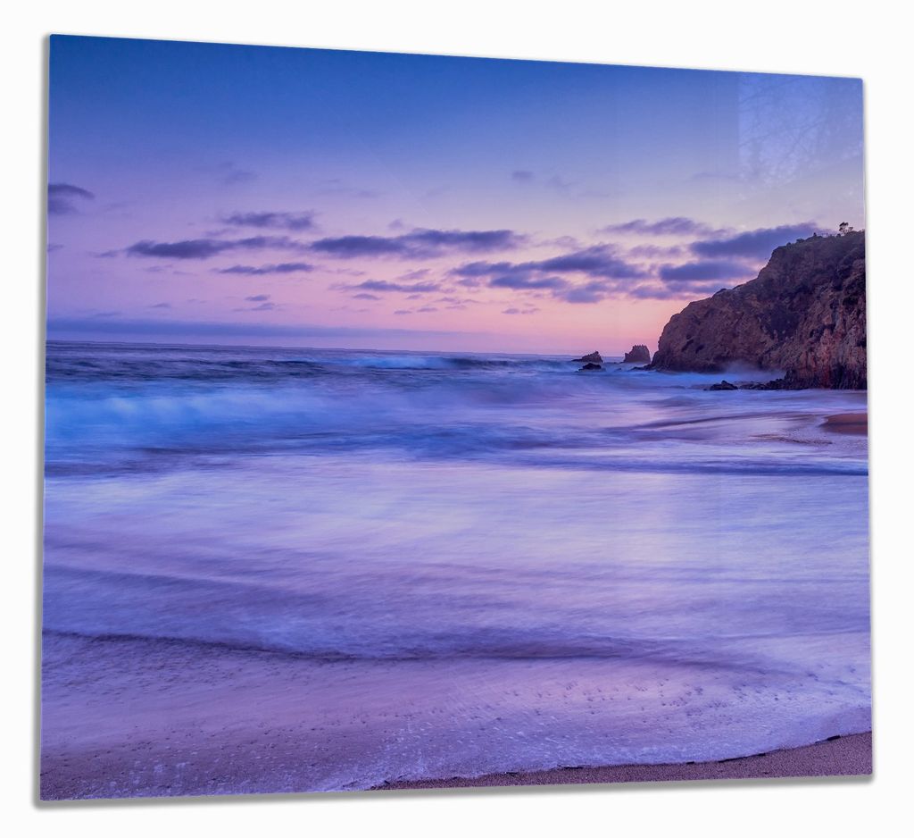 Wallario Herdabdeckplatte aus Glas, Größe 60 x 52 cm 1-teilig, Motiv Kalifornischer Strand am Abend mit Felsenküste