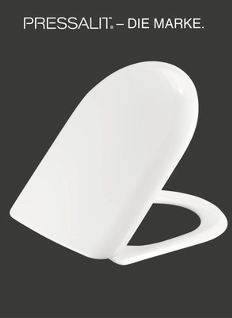 A white toilet seat with a lid is shown against a dark background.