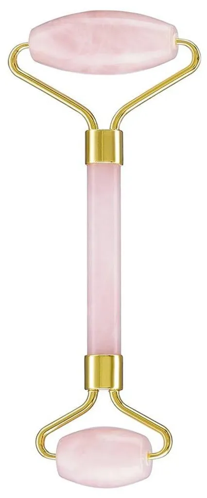 Rouleau facial en quartz rose naturel contre les poches et le teint terne