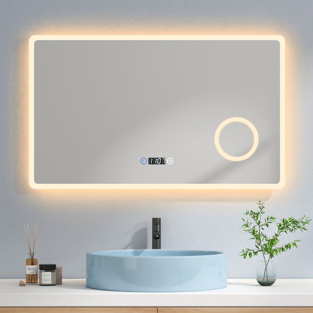 A modern bathroom vanity with a light blue sink and a large LED mirror above it.