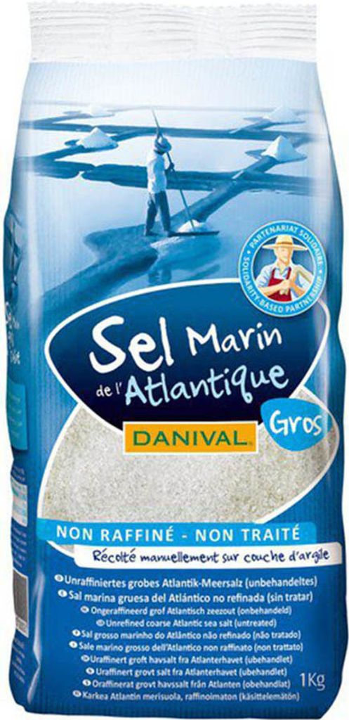 A bag of sea salt with an illustration of salt harvesting.
