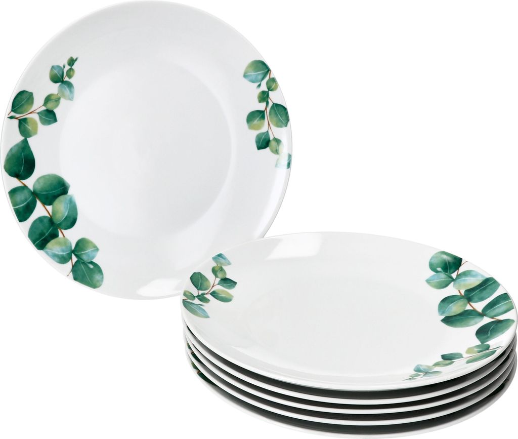 A stack of white plates with a green eucalyptus leaf pattern on the rim, with one plate slightly separated and angled.