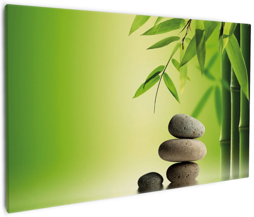 Wallario Premium Leinwandbild Steinstapel im Grünen in Größe 60 x 90 cm