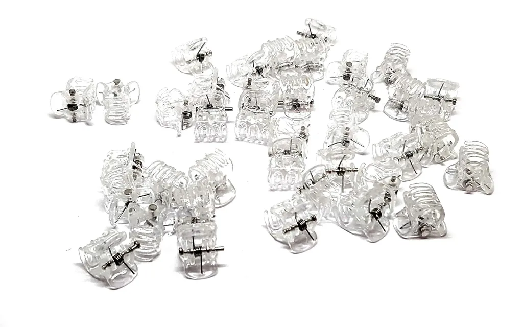 100 Mini barrettes orchidées : fixez vos mèches rebelles avec style