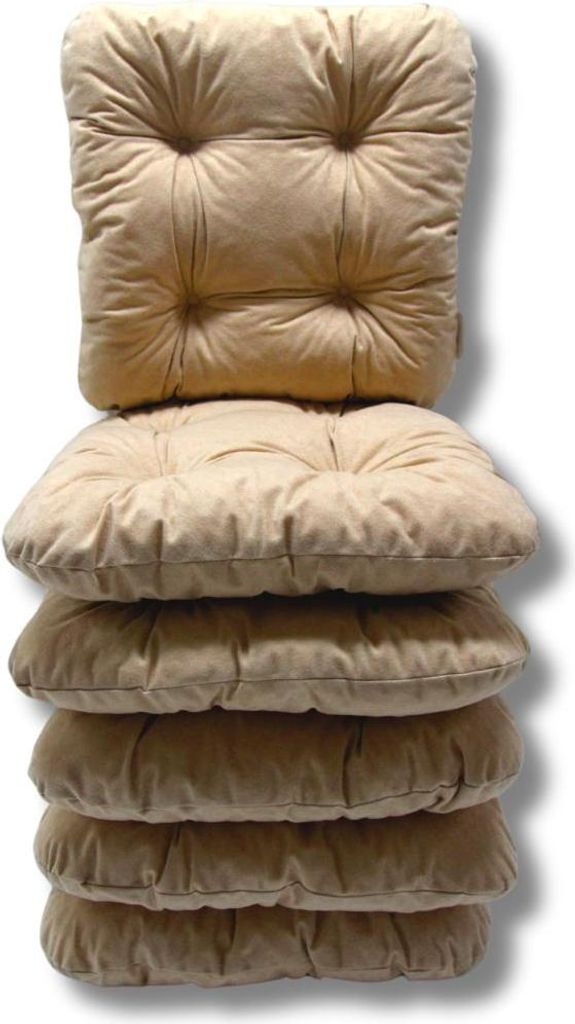 A stack of beige seat cushions.
