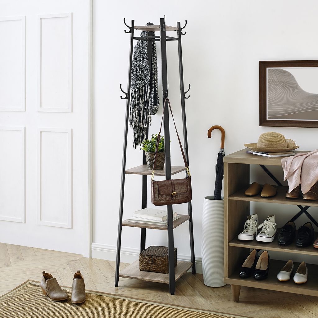 An entryway scene with a coat rack, shoe rack, and accessories.