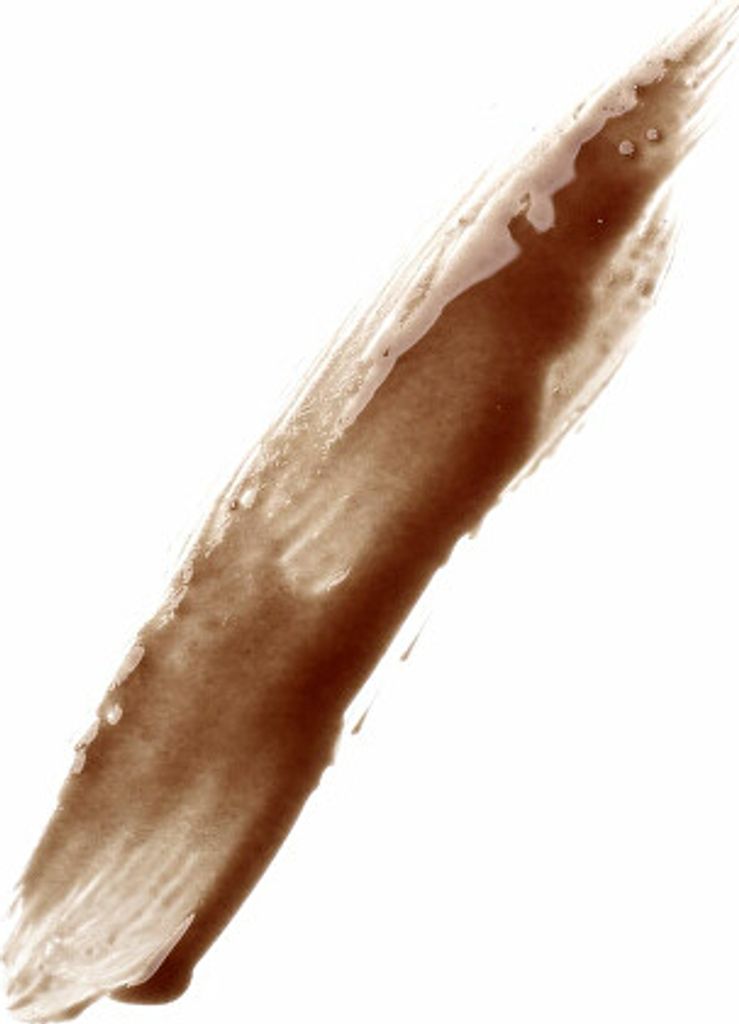 A swatch of brown cosmetic product on a white background.