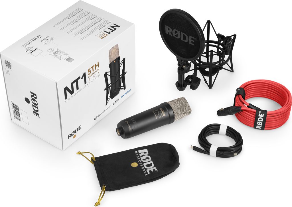 A collection of Rode NT1 5th Generation microphone accessories, including the microphone itself, a shock mount, cables, and a carrying pouch, laid out on a white background.
