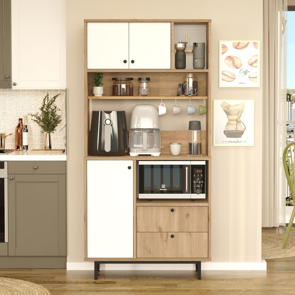 A kitchen pantry cabinet with various appliances and decor items.