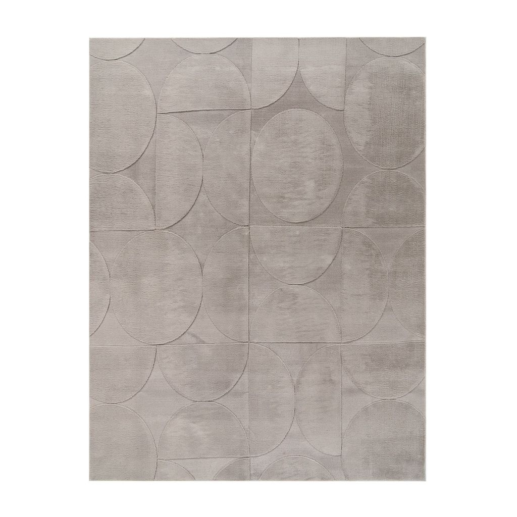 A flat lay of a grey rug with a geometric pattern of circles and semi-circles.