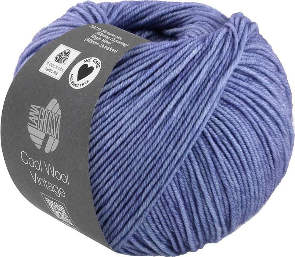 A ball of blue yarn with a label wrapped around it.