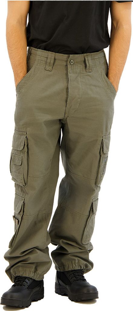 A person wearing olive cargo pants and black boots.