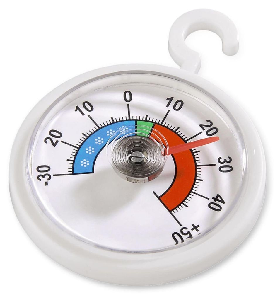 A close-up view of a round thermometer with a white casing and a hook for hanging.
