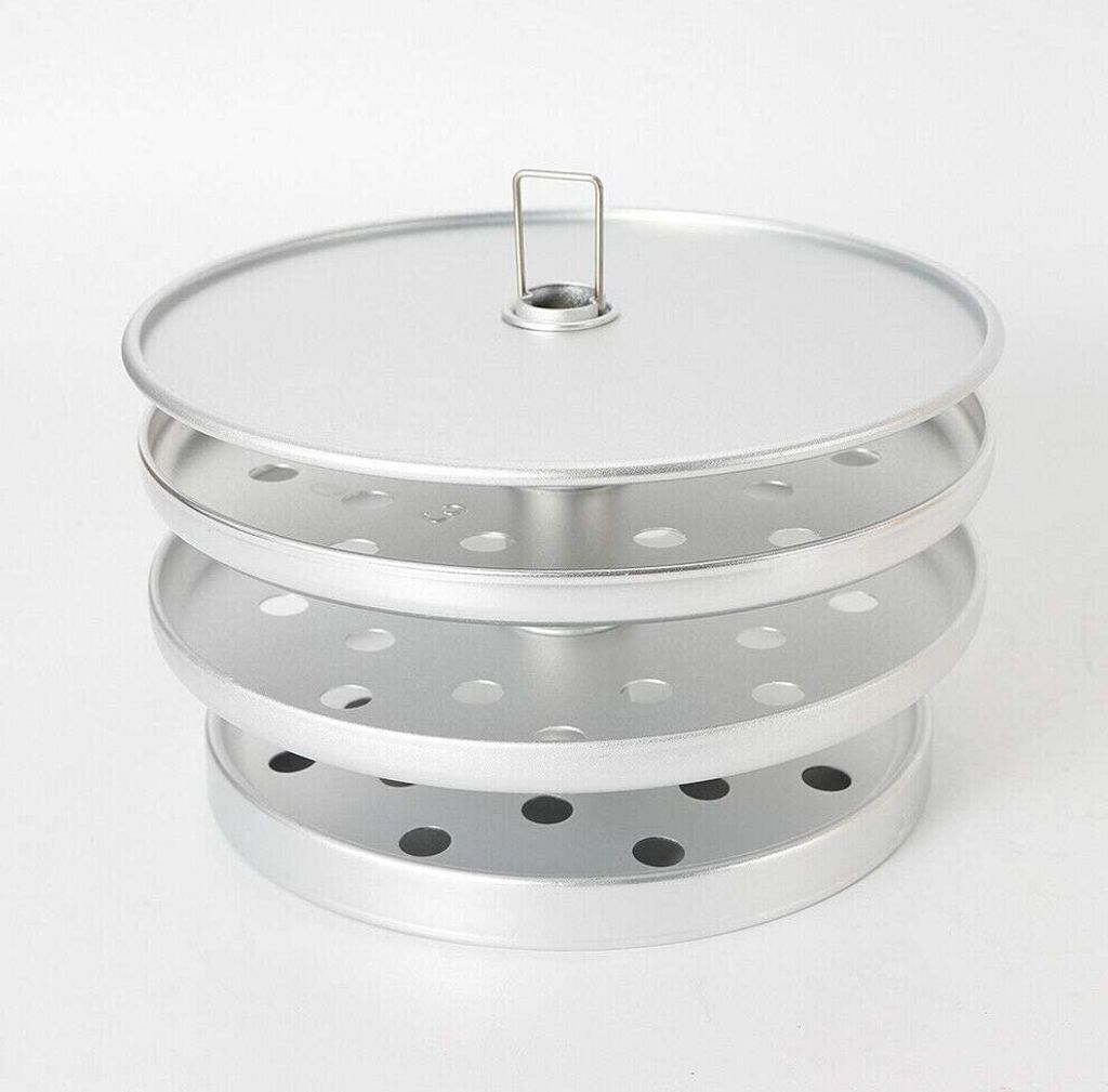 A silver-colored kitchen appliance with multiple perforated trays stacked on top of each other, topped with a lid and a small handle.