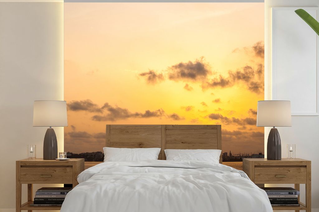 MuchoWow Fototapete für Wohnzimmer oder Schlafzimmer Wandtapete Vinyl Motivtapete Sonnenuntergang über dem Wasser mit der Stadt Dakar im Hinter...