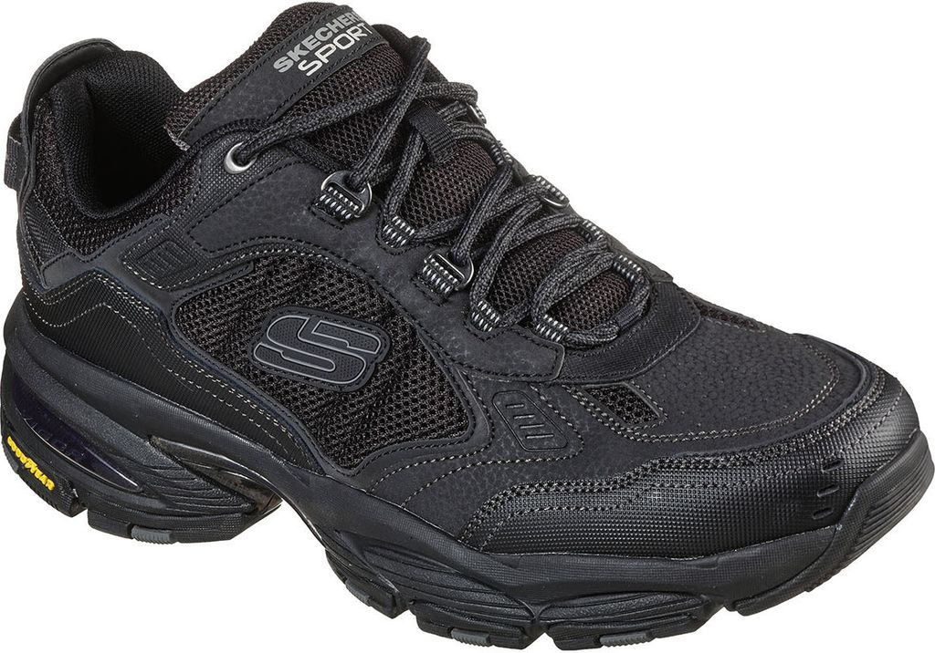 A black Skechers sneaker is shown from a side angle against a white background.