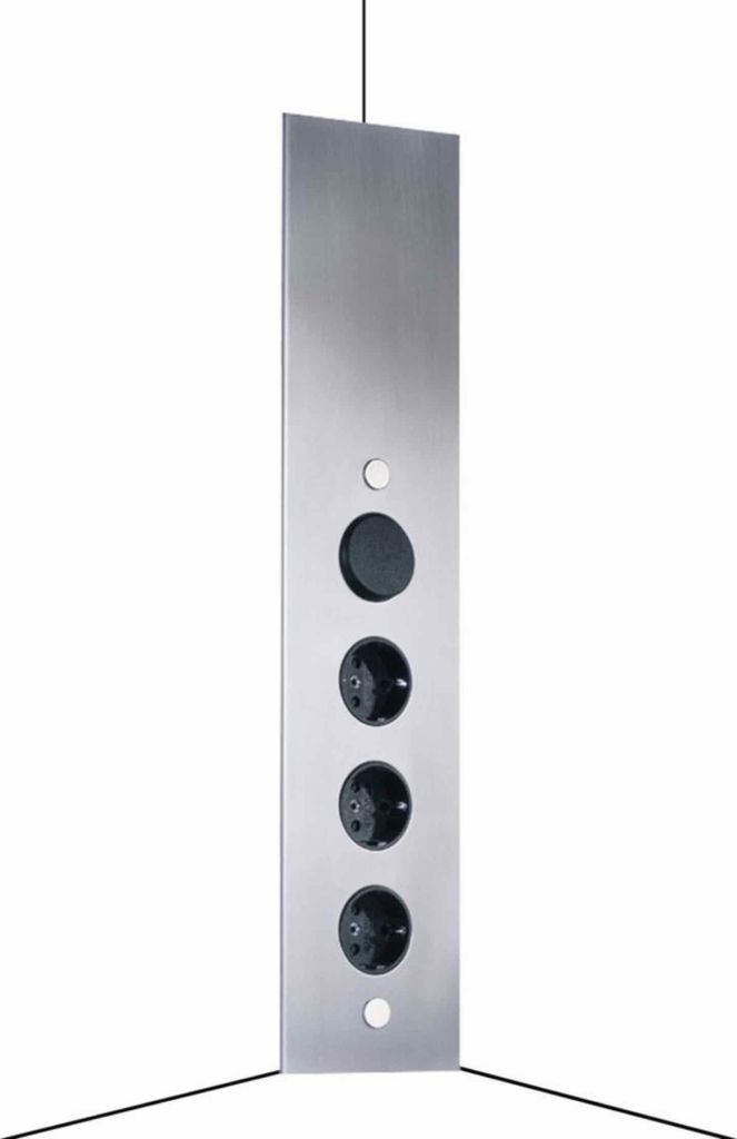 A vertical stainless steel power strip with multiple outlets and a switch, shown against a white background.