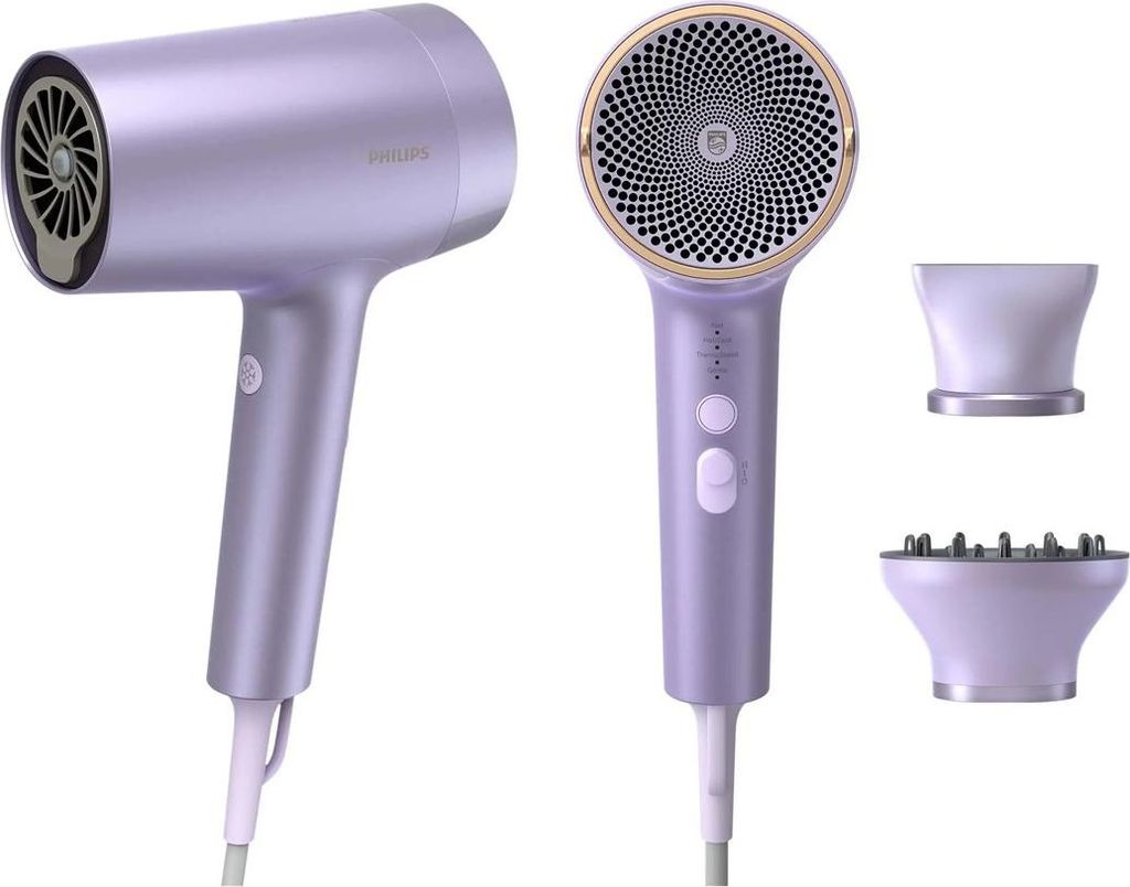 A studio product shot of a purple Philips hair dryer and its accessories against a white background.
