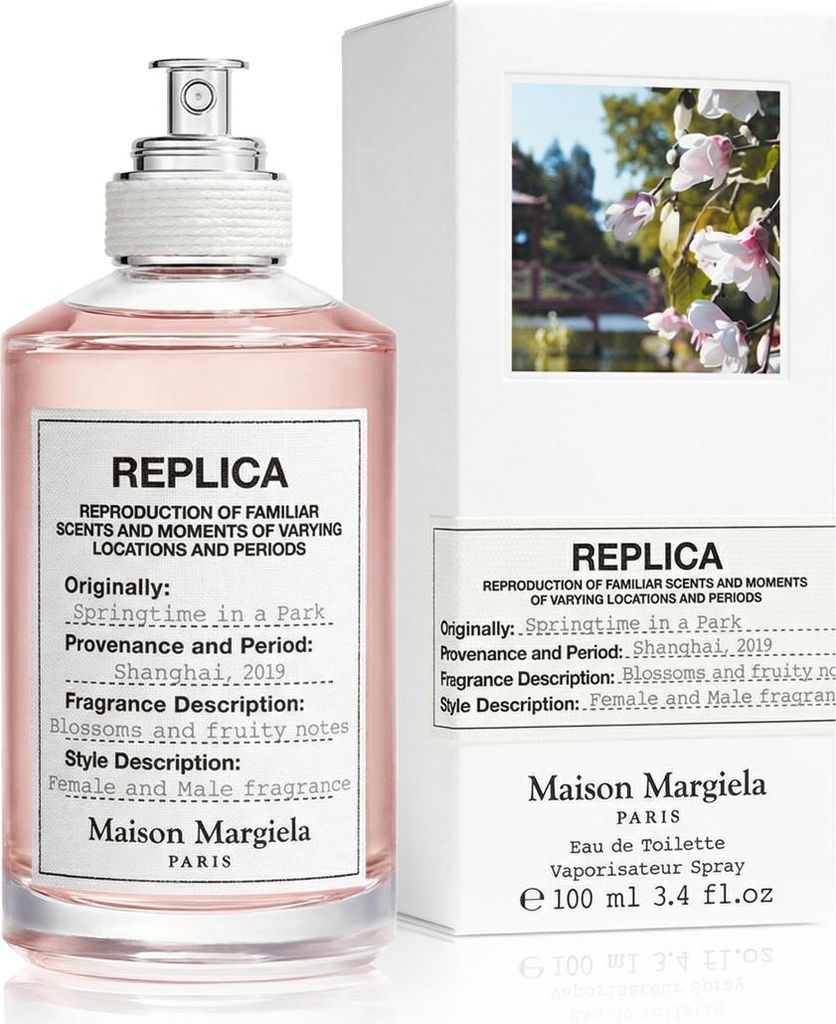 A bottle of Maison Margiela Replica Springtime in a Park Eau de Toilette and its packaging.