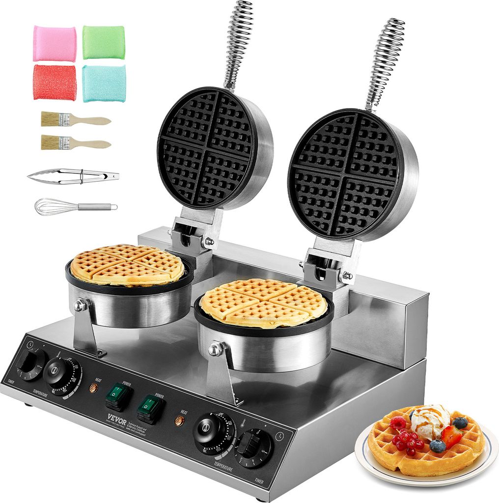 A commercial double-headed waffle maker with accessories and a finished waffle on a plate.